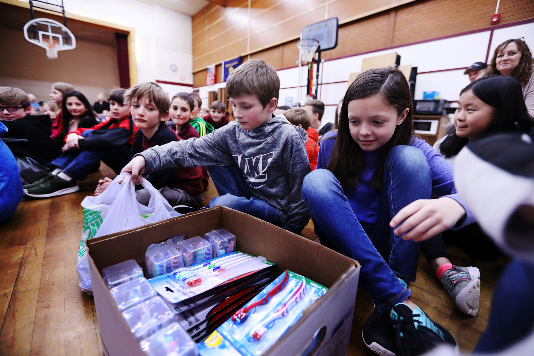 Butte Central students donate toothbrushes to local dentist